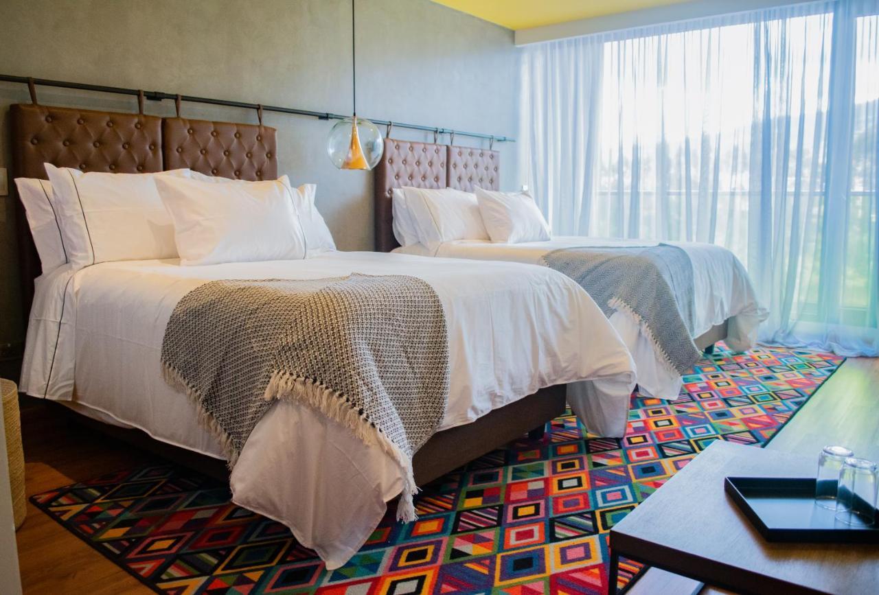 Hotel V1501 باستو المظهر الخارجي الصورة A room at the hotel