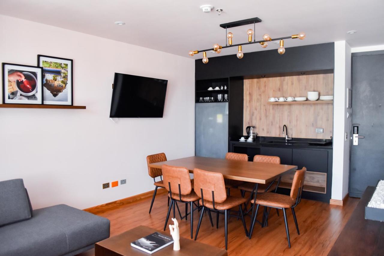 Hotel V1501 باستو المظهر الخارجي الصورة A kitchen in a serviced apartment