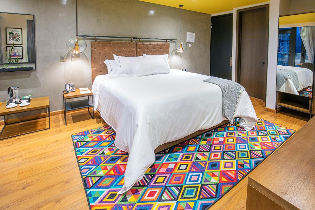 Hotel V1501 باستو المظهر الخارجي الصورة A carpet in a bedroom